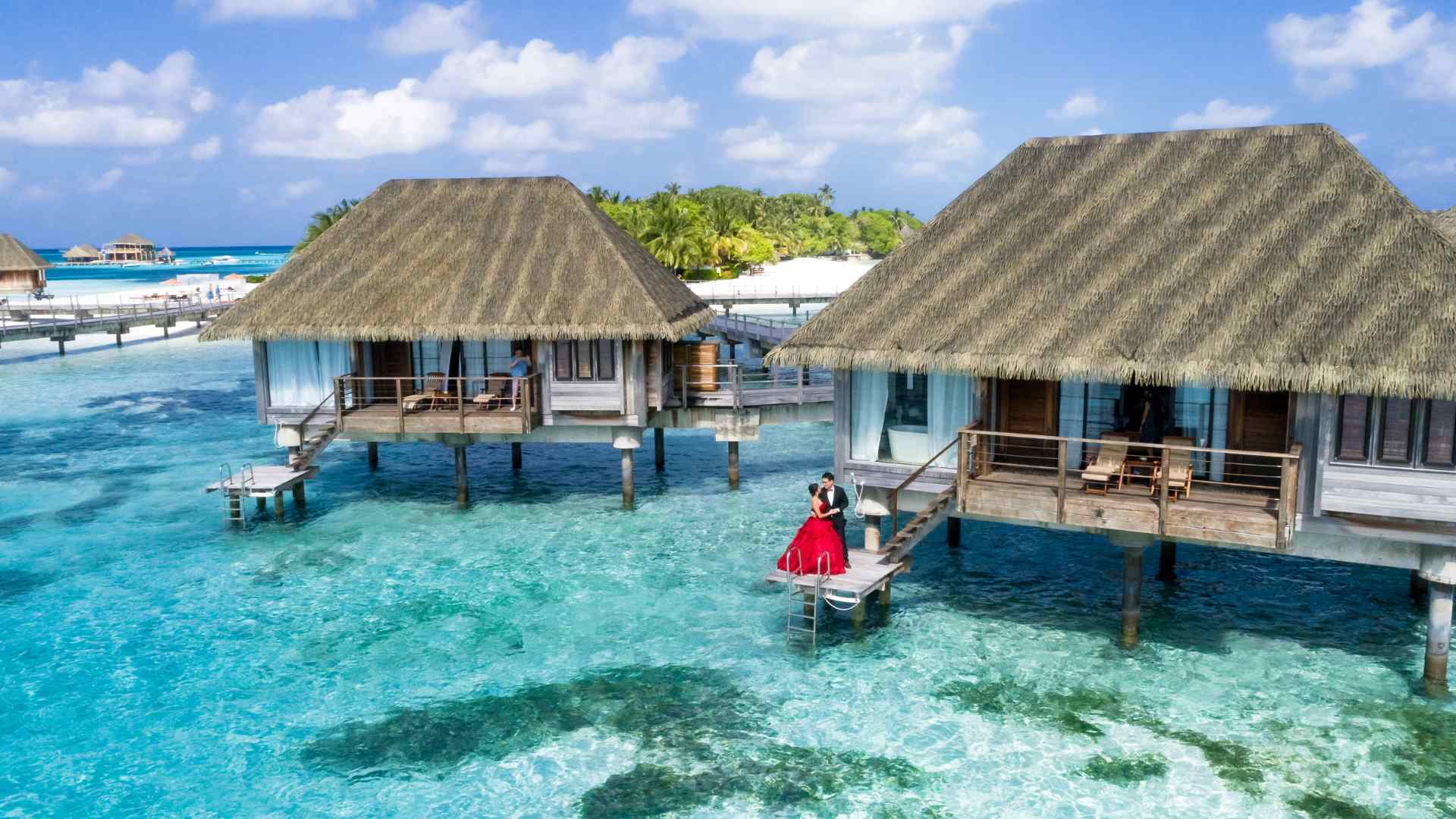 Tropical overwater bungalow with a private deck