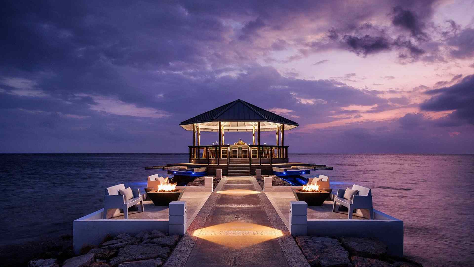 Private deck of a Sandals South Coast overwater bungalow above the Caribbean Sea