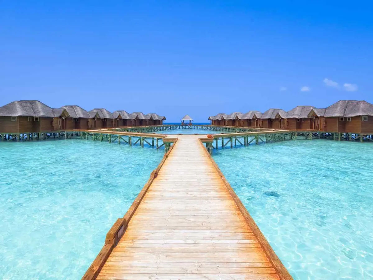A tropical Caribbean lagoon with overwater accommodations
