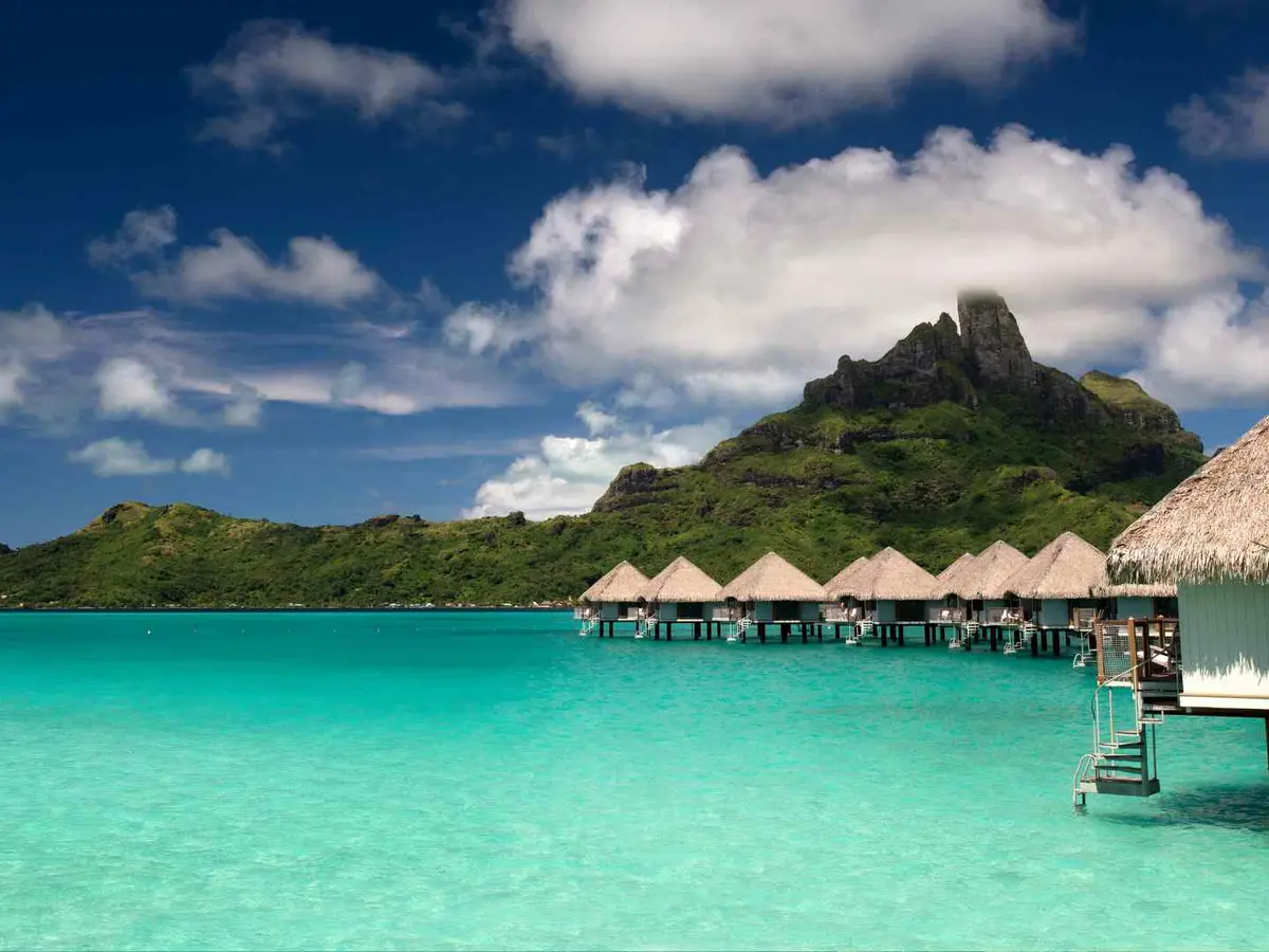 Lagoon villas surrounded by blue water in Bora Bora