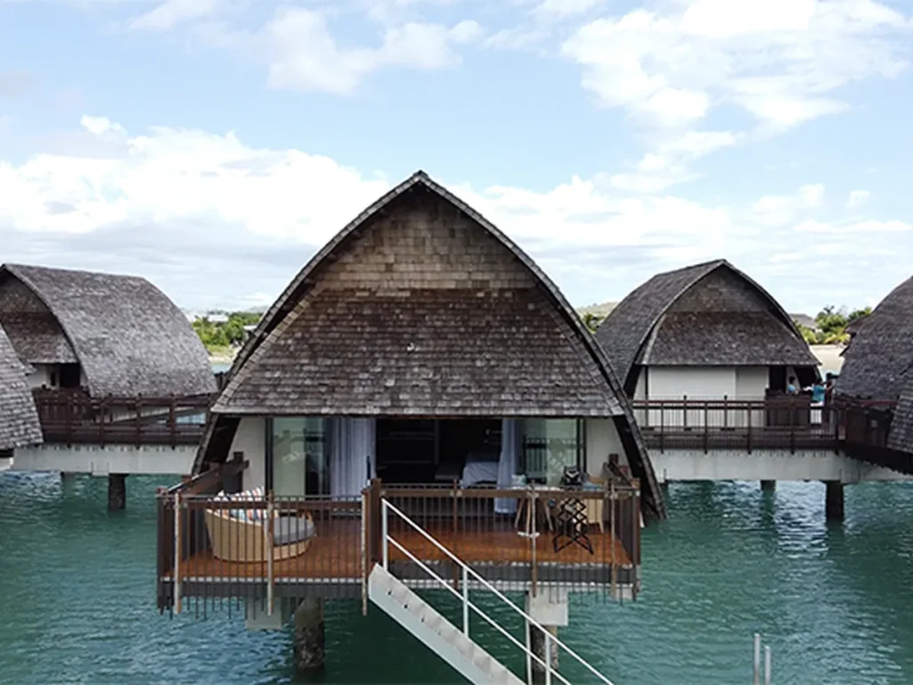 Fiji Marriott Momi Bay thatched overwater bure with deck facing the lagoon