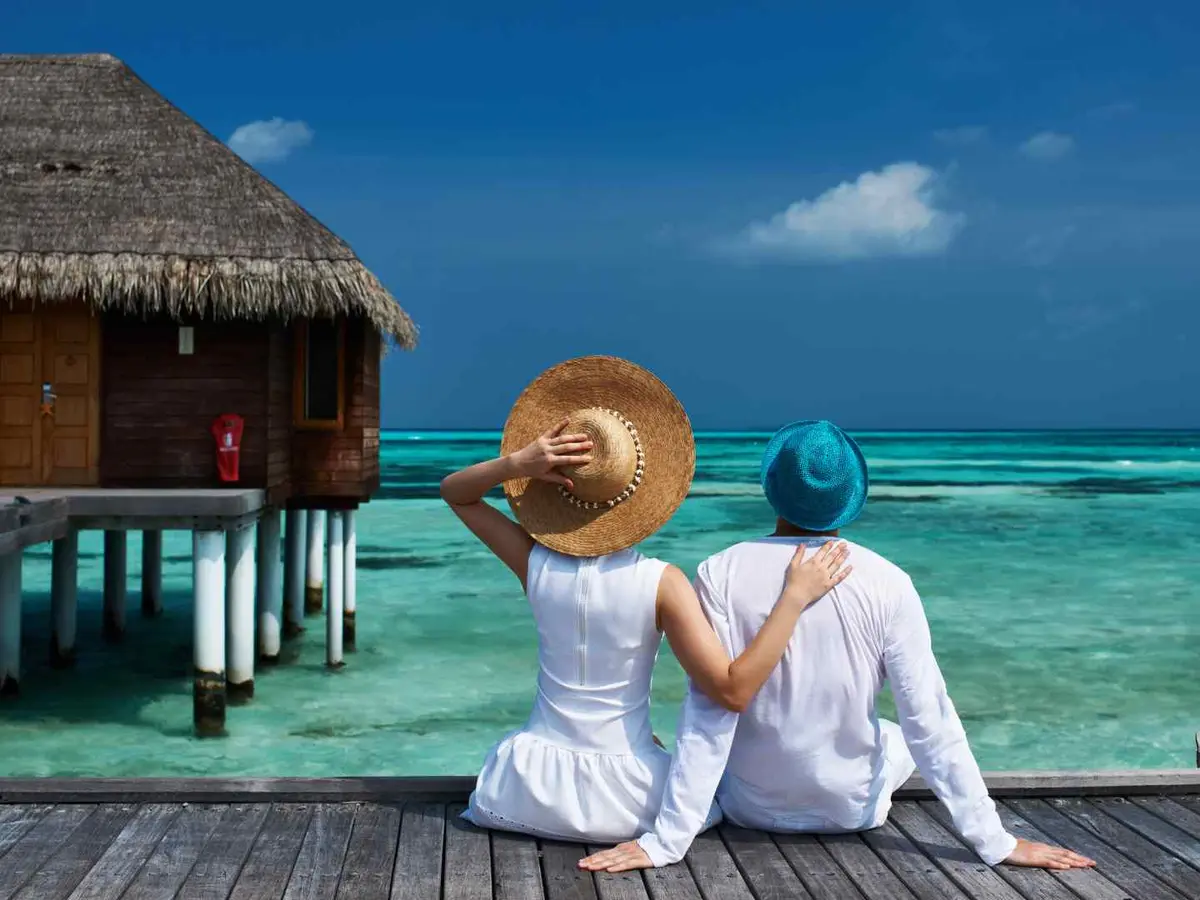 A boardwalk connecting overwater villas in the Maldives
