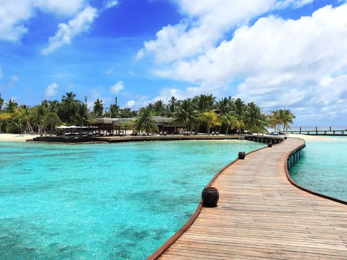 An island retreat with overwater villas in the Middle East