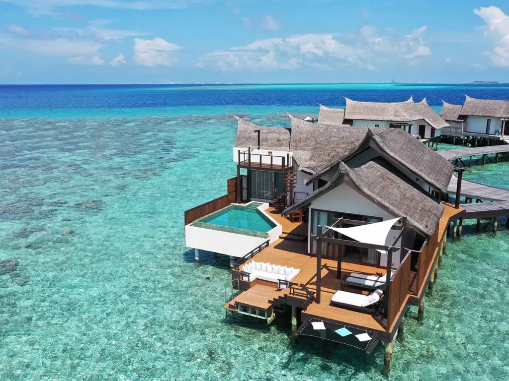 OZEN Reserve Bolifushi overwater villa with a private pool above a turquoise lagoon