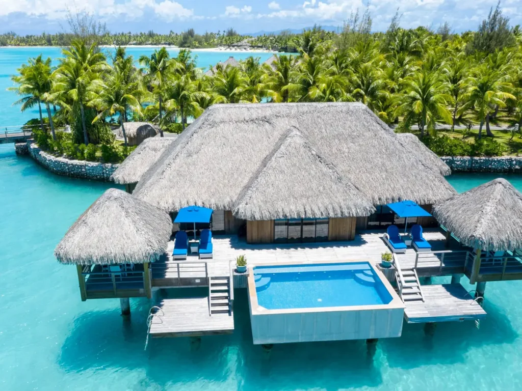 Aerial view of a St. Regis Bora Bora overwater villa with private pool